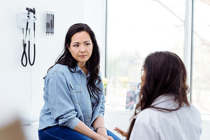 Woman talking with her physician